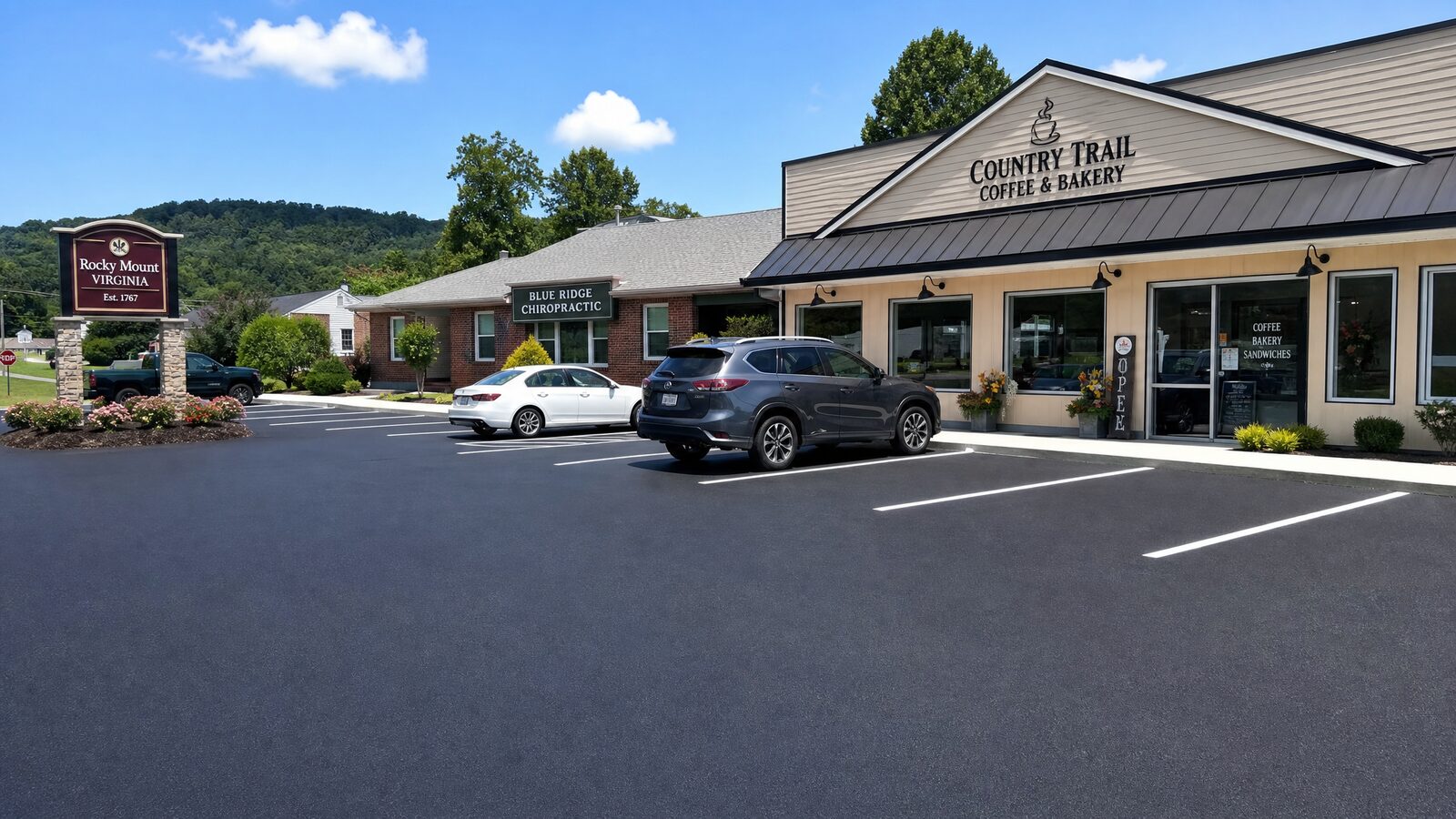 Freshly sealed commercial parking lot with crisp asphalt at a small business in Christiansburg, VA